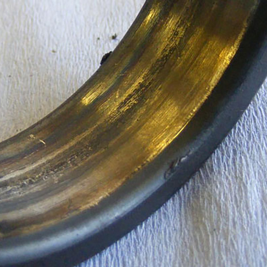 Inner ring bore creep due to a worn shaft
