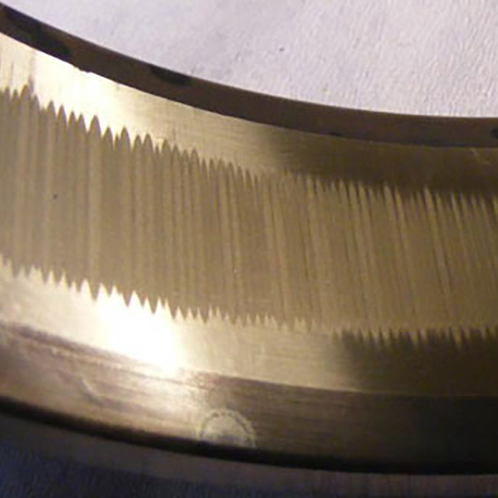 Electric arc pitting in a cylindrical roller outer ring